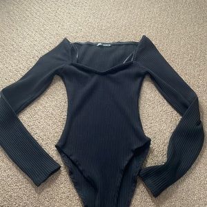 Black long sleeve bodysuit with sweetheart neckline